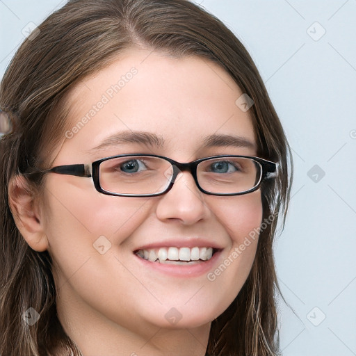 Joyful white young-adult female with long  brown hair and blue eyes