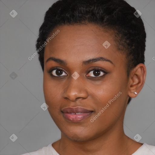 Joyful black young-adult female with short  brown hair and brown eyes