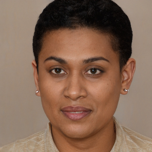 Joyful latino young-adult female with short  brown hair and brown eyes