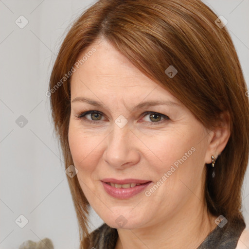 Joyful white adult female with medium  brown hair and brown eyes