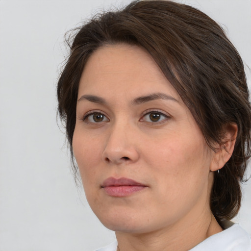 Neutral white young-adult female with medium  brown hair and brown eyes
