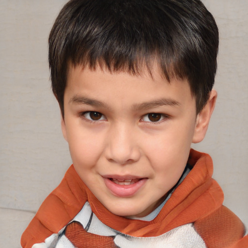 Joyful white child male with short  brown hair and brown eyes