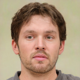 Neutral white young-adult male with short  brown hair and grey eyes