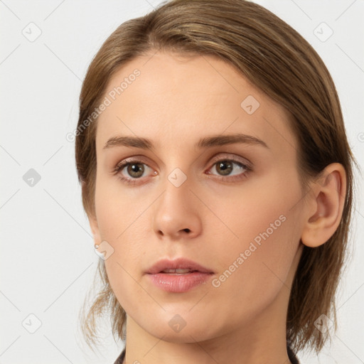 Neutral white young-adult female with medium  brown hair and brown eyes