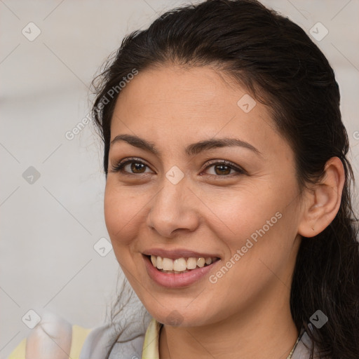 Joyful white young-adult female with long  brown hair and brown eyes