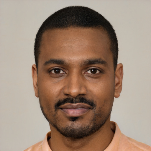 Neutral black young-adult male with short  black hair and brown eyes