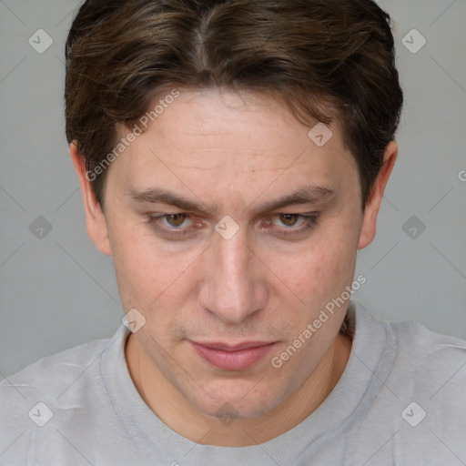 Joyful white adult female with short  brown hair and brown eyes