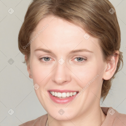 Joyful white young-adult female with medium  brown hair and grey eyes