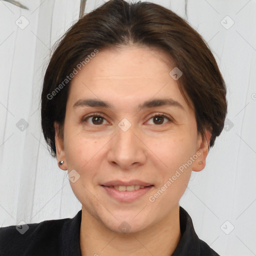 Joyful white adult female with short  brown hair and brown eyes