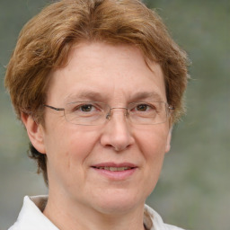 Joyful white middle-aged female with short  brown hair and brown eyes