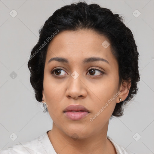 Neutral latino young-adult female with medium  black hair and brown eyes