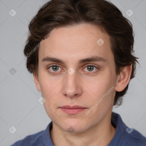 Neutral white young-adult male with short  brown hair and grey eyes