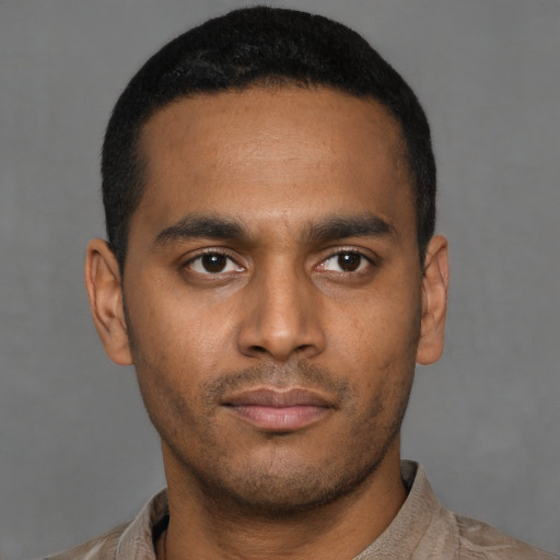 Neutral latino young-adult male with short  black hair and brown eyes