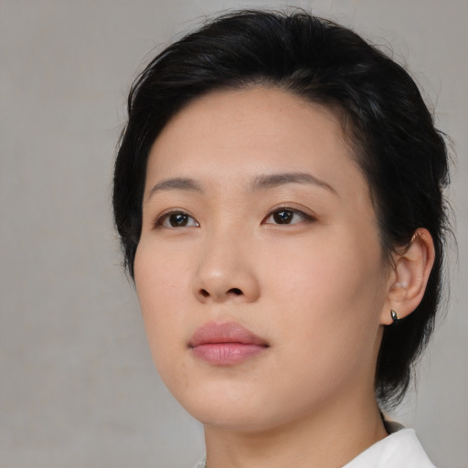 Neutral asian young-adult female with medium  black hair and brown eyes