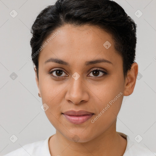 Joyful latino young-adult female with short  brown hair and brown eyes