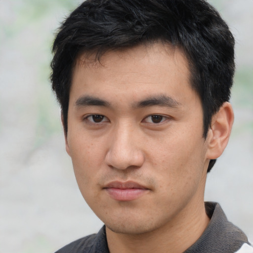 Neutral asian young-adult male with short  black hair and brown eyes