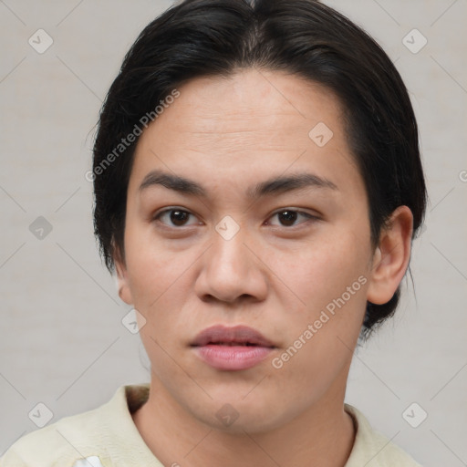 Joyful asian young-adult female with short  brown hair and brown eyes