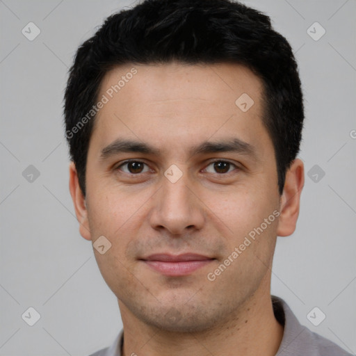 Joyful white young-adult male with short  black hair and brown eyes