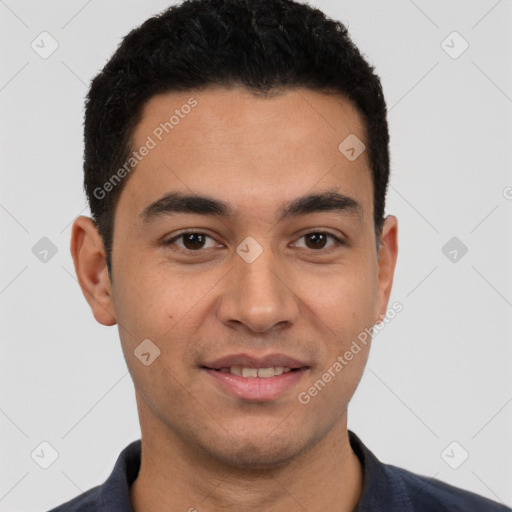 Joyful white young-adult male with short  black hair and brown eyes