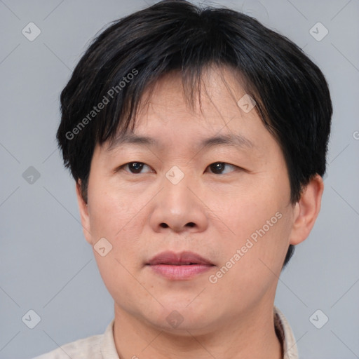 Neutral asian adult female with short  brown hair and brown eyes