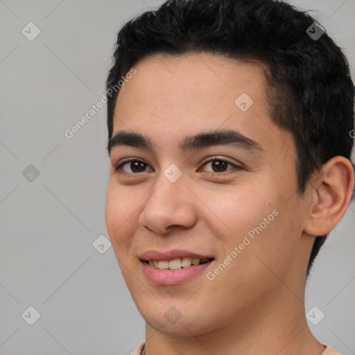 Joyful latino young-adult male with short  black hair and brown eyes