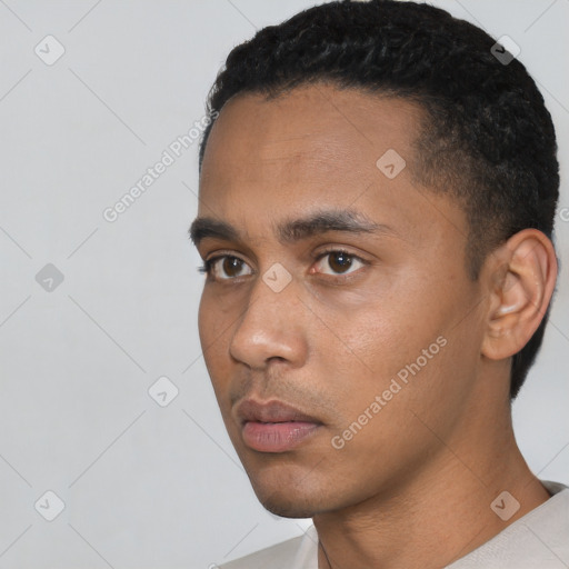 Neutral latino young-adult male with short  black hair and brown eyes