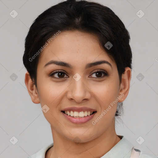 Joyful latino young-adult female with short  brown hair and brown eyes