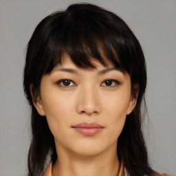 Neutral asian young-adult female with medium  brown hair and brown eyes