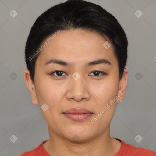 Joyful asian young-adult female with short  black hair and brown eyes