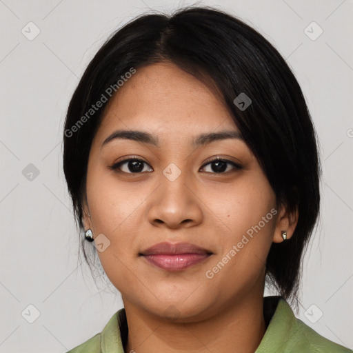 Joyful asian young-adult female with medium  black hair and brown eyes