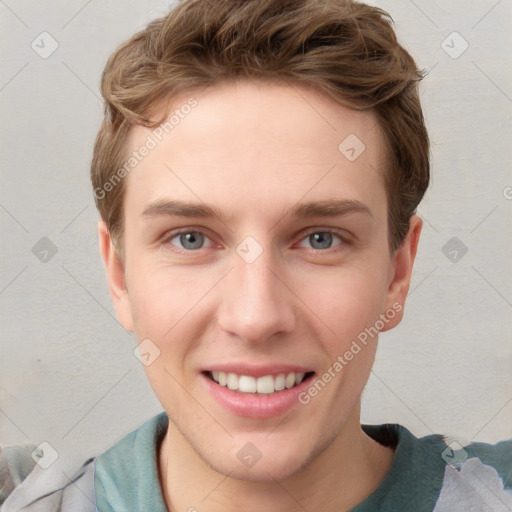 Joyful white young-adult male with short  brown hair and blue eyes