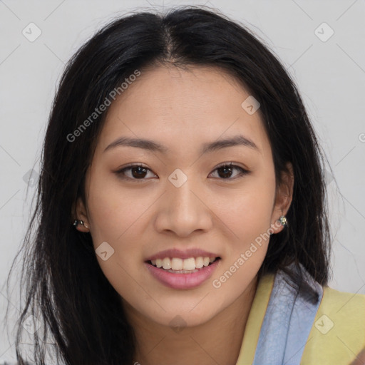 Joyful asian young-adult female with long  brown hair and brown eyes