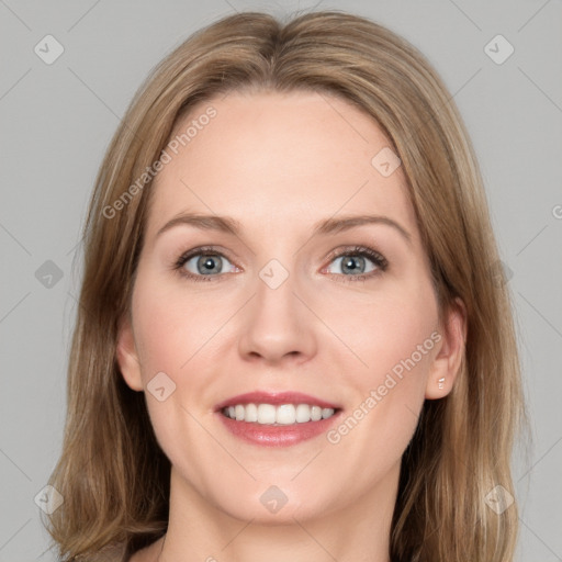 Joyful white young-adult female with medium  brown hair and blue eyes