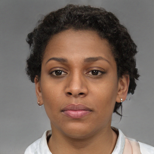 Neutral black young-adult female with short  brown hair and brown eyes