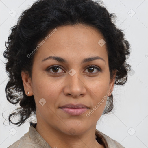 Joyful latino adult female with medium  brown hair and brown eyes