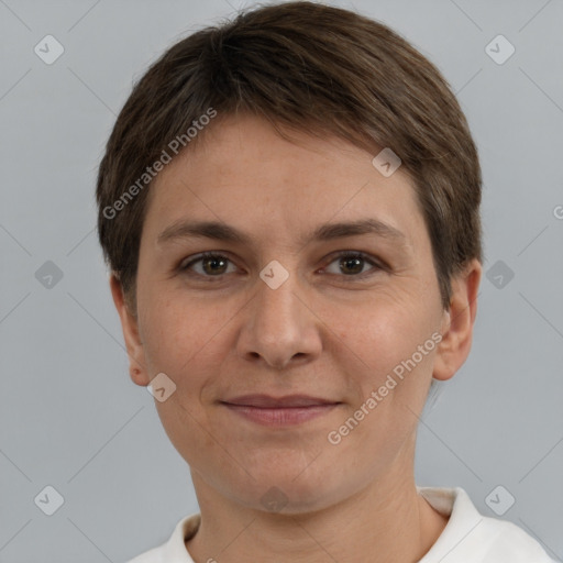 Joyful white adult female with short  brown hair and brown eyes