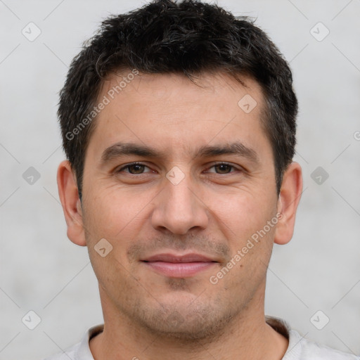 Joyful white young-adult male with short  brown hair and brown eyes