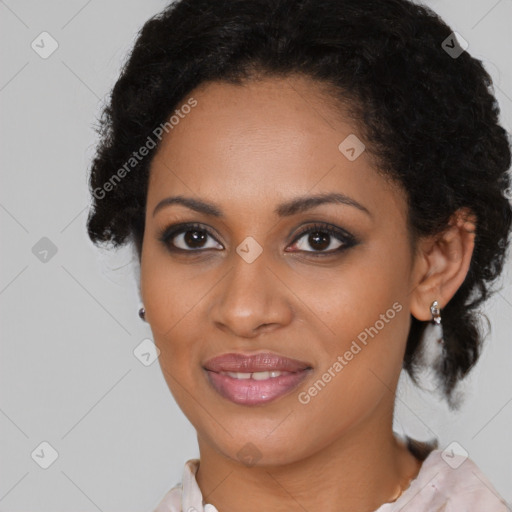 Joyful black young-adult female with medium  brown hair and brown eyes