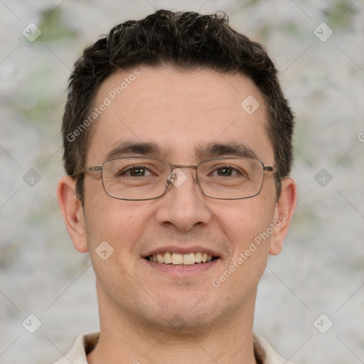 Joyful white adult male with short  brown hair and brown eyes