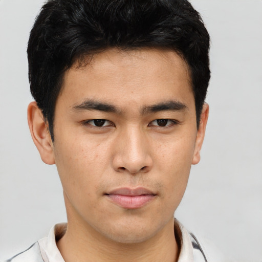 Neutral asian young-adult male with short  brown hair and brown eyes