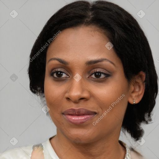 Joyful black young-adult female with medium  brown hair and brown eyes