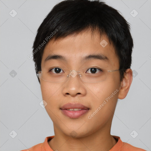 Joyful asian young-adult male with short  brown hair and brown eyes