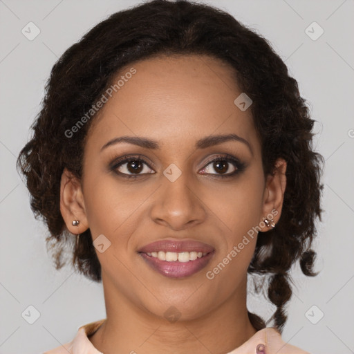 Joyful black young-adult female with medium  brown hair and brown eyes