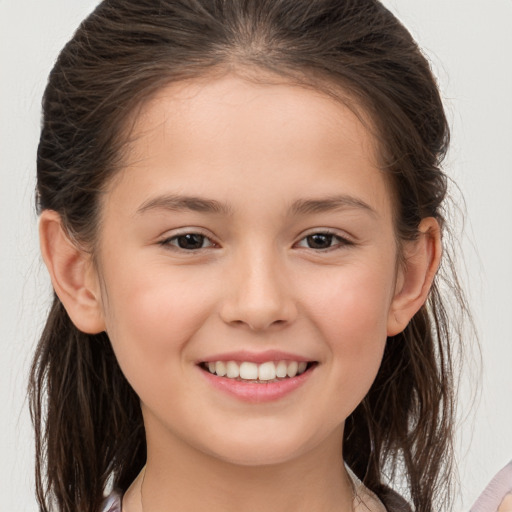 Joyful white child female with medium  brown hair and brown eyes