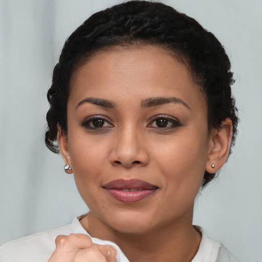 Joyful asian young-adult female with short  brown hair and brown eyes