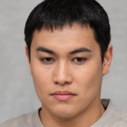 Neutral asian young-adult male with short  brown hair and brown eyes