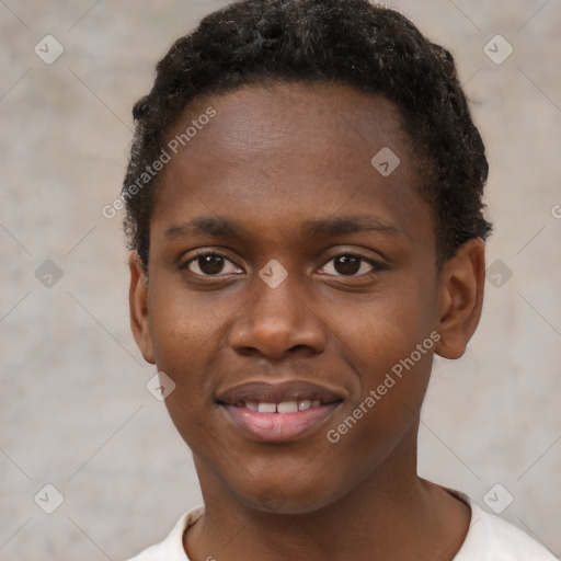 Joyful black young-adult male with short  brown hair and brown eyes