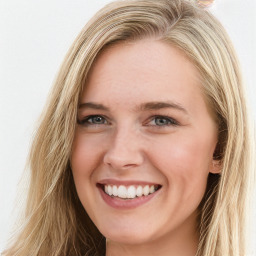 Joyful white young-adult female with long  brown hair and blue eyes