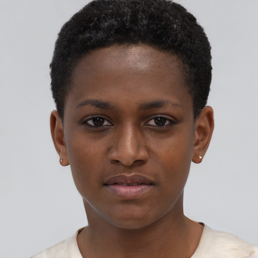 Neutral black child female with short  brown hair and brown eyes