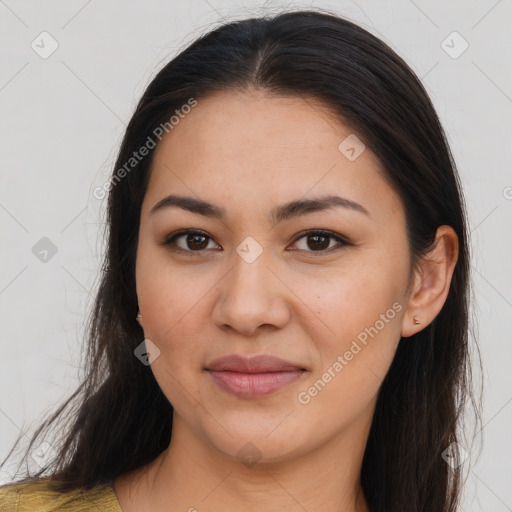 Joyful latino young-adult female with long  brown hair and brown eyes